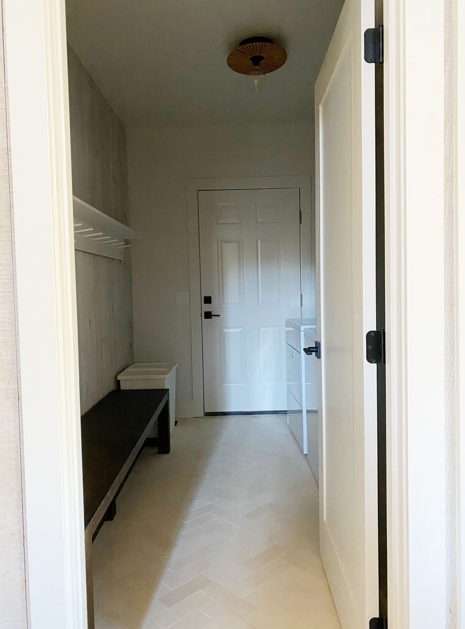 Main floor mudroom/laundry. 