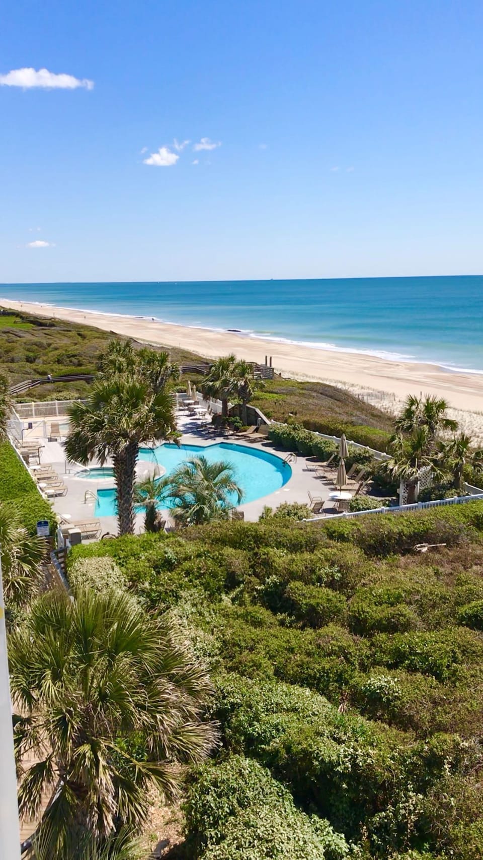 View of year-round heated pool from your balcony
