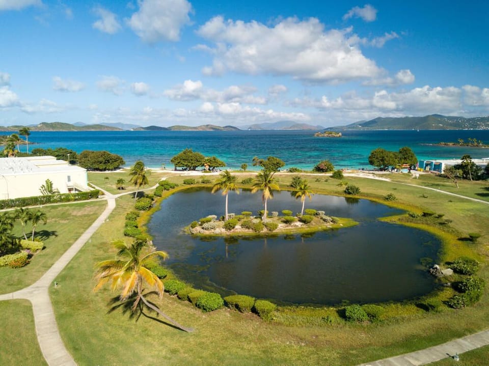 Pond and beach w/ a view of St. John