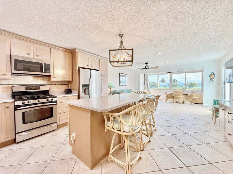 Kitchen w/ Center Island and Bar Style Seating