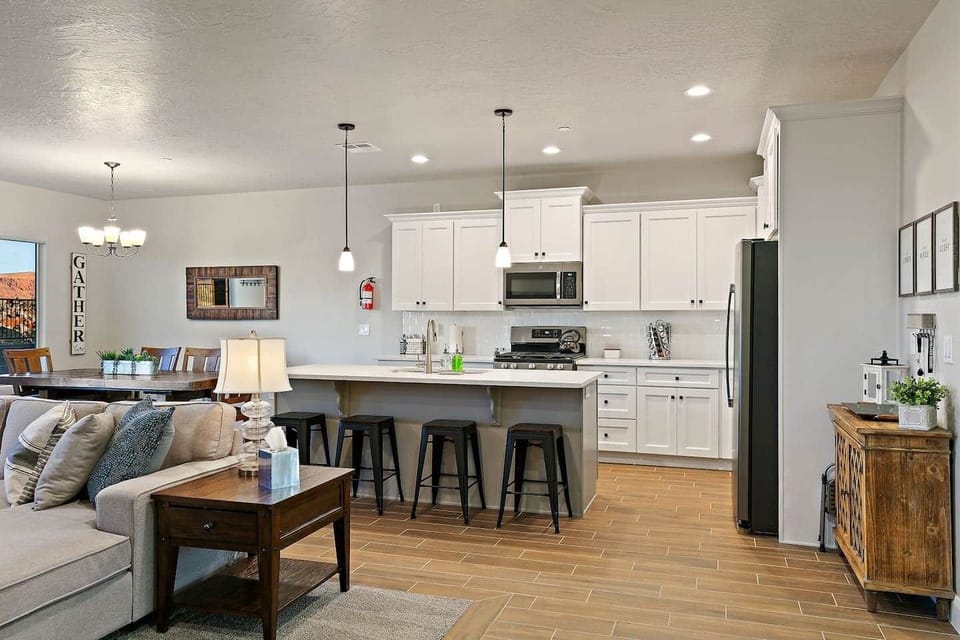 Next to the Family Room, is our beautiful KITCHEN!  Equipped with everything you could need on your vacation and laid out to provide ample space for your family and guests.  Use this space to relax, eat and make memories with the ones you love!
