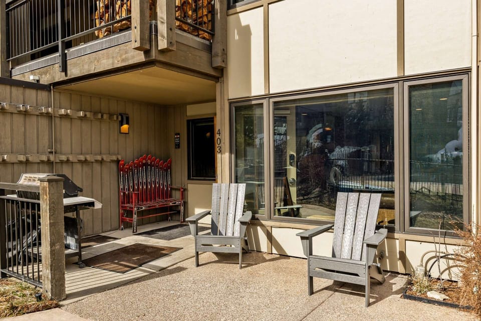 Store your skis in your ski rack, grab a cold beverage from the fridge and  then sit, relax & soak up the sunshine on your patio!