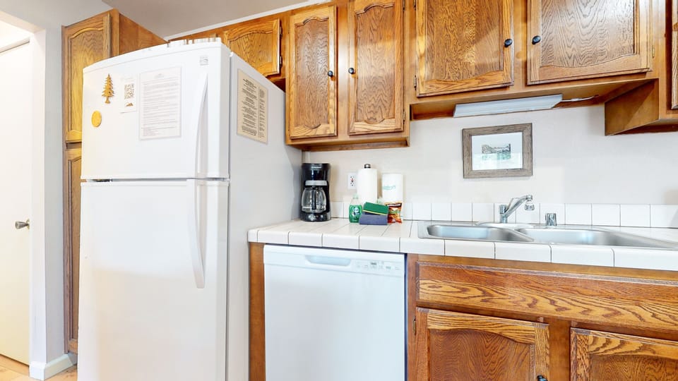 Condo, 1 Bedroom | Private kitchen | Fridge, microwave, dishwasher, coffee/tea maker