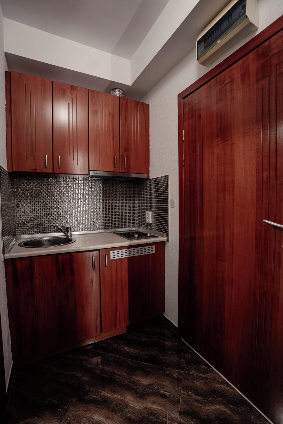 Desk, blackout drapes, soundproofing, free cribs/infant beds