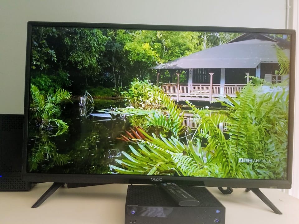 Smart TV with Netflix, Amazon, and Spectrum cable