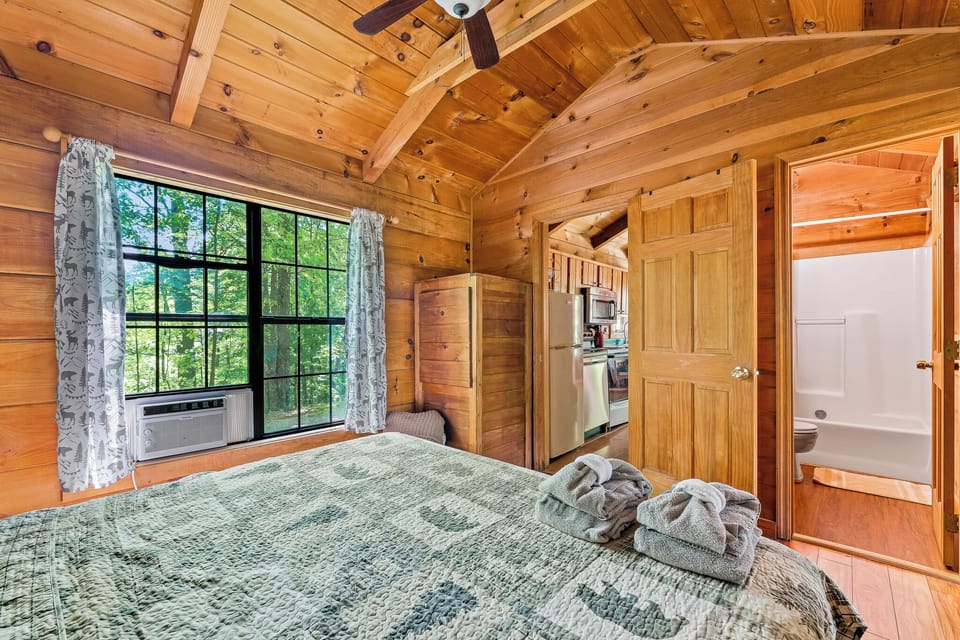 Classic cabin style with soft sheets, fresh air, and all the comforts of home.