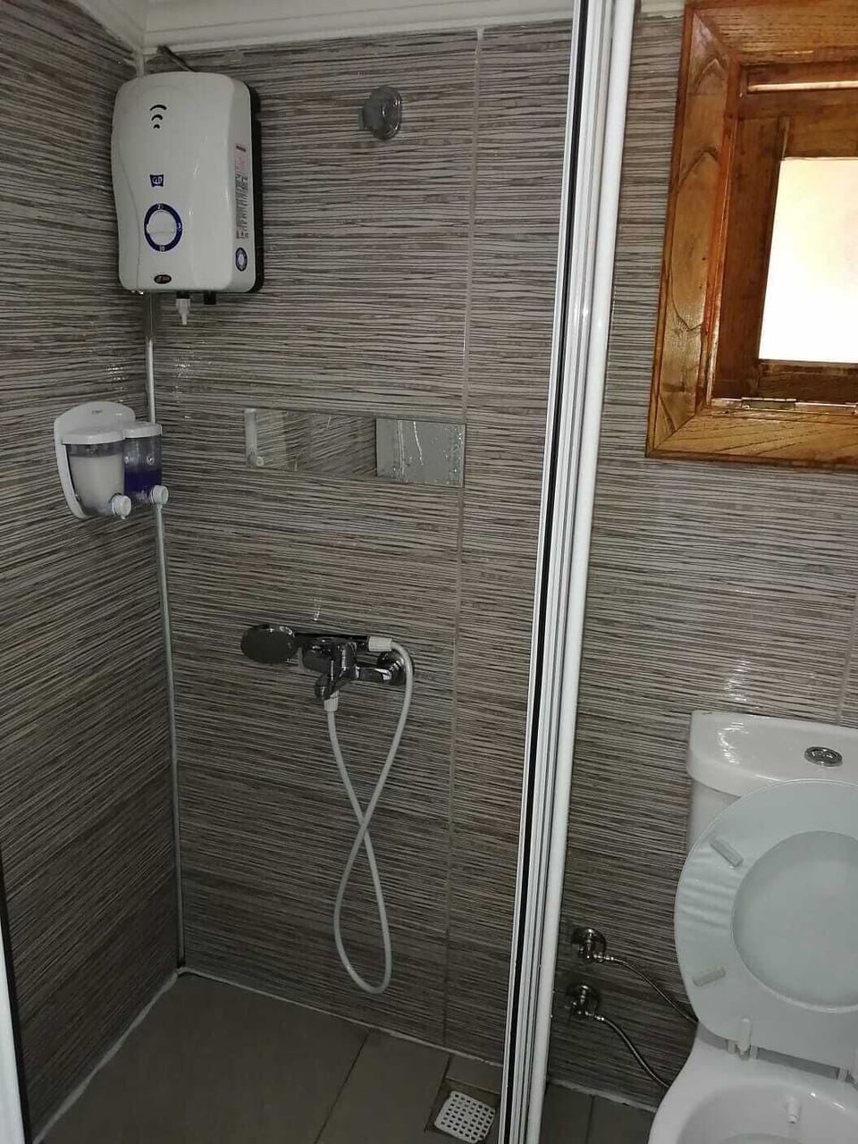 Bungalow, 1 Double Bed | Bathroom | Shower, hair dryer (on request), slippers, towels