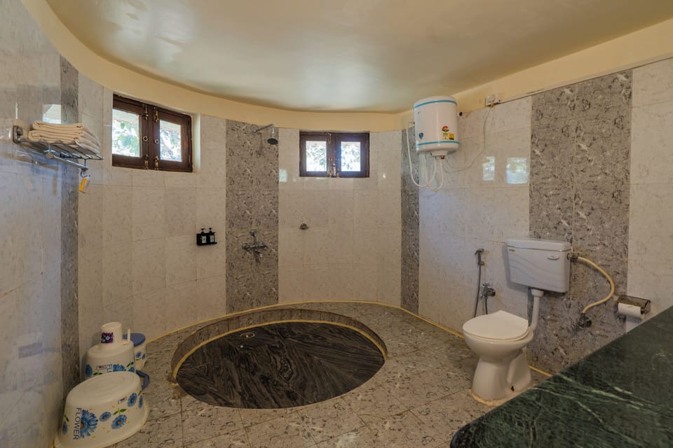 Shower, rainfall showerhead, towels