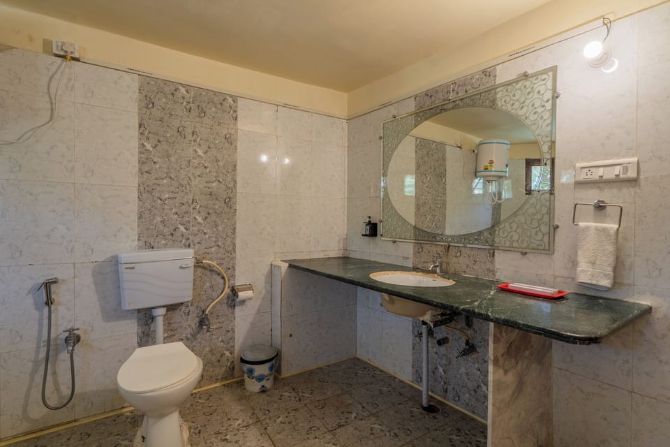 Shower, rainfall showerhead, towels