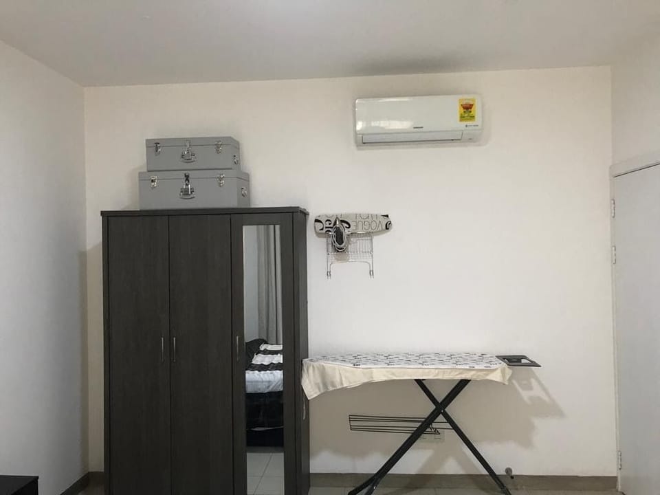 Wardrobe and ironing board