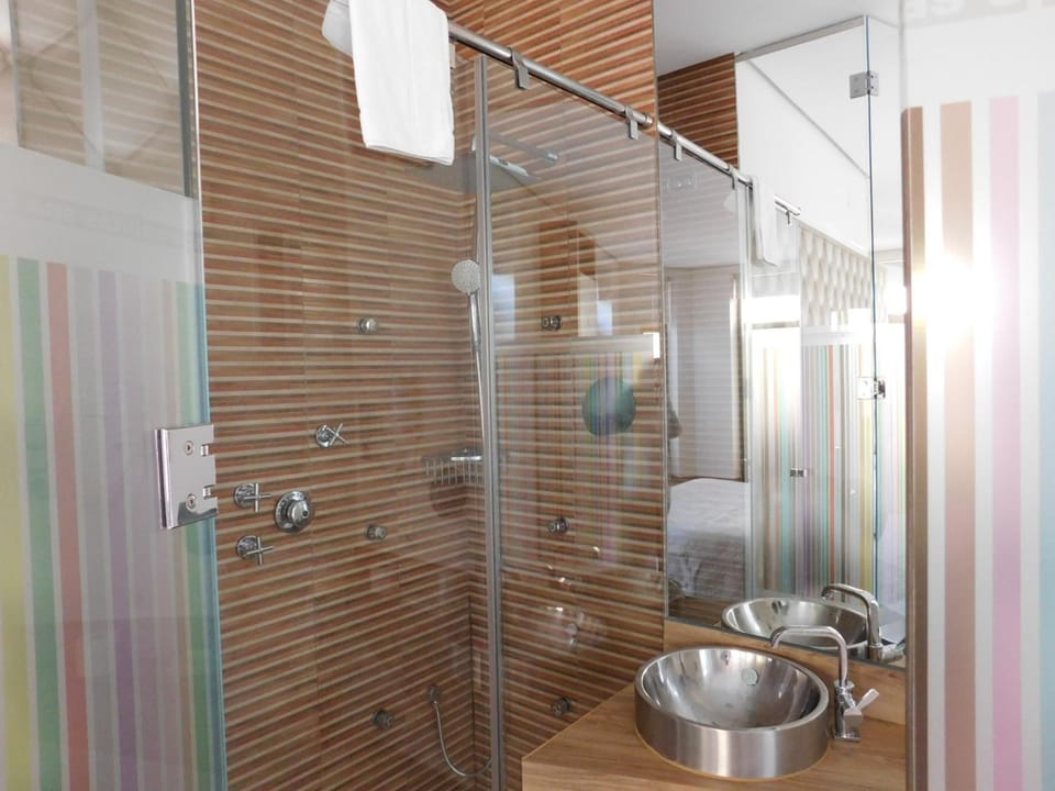 Shower, free toiletries, hair dryer, bathrobes