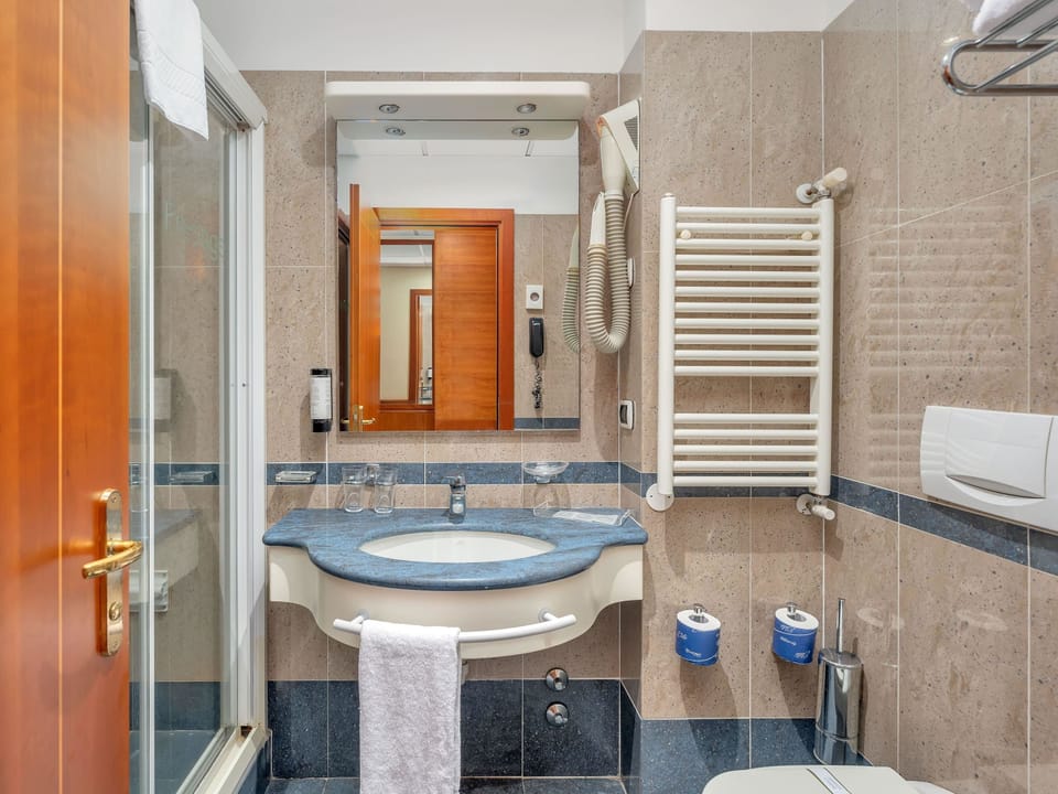 Free toiletries, hair dryer, bathrobes, slippers
