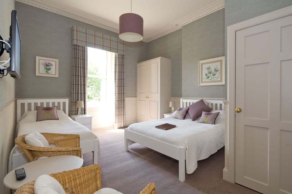 Triple Room, Multiple Beds, Ensuite | In-room safe, iron/ironing board, free WiFi, bed sheets