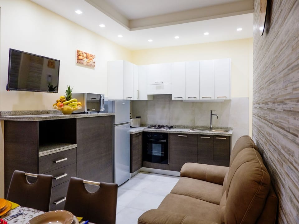 Apartment, 2 Bedrooms | Private kitchen | Full-size fridge, microwave, oven, stovetop