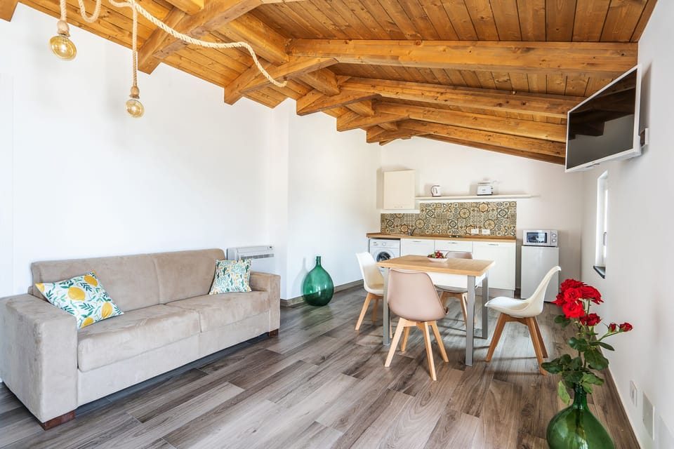 Family Apartment, 2 Bedrooms, 1 Bathroom, Sea View | Living area | 32-inch flat-screen TV with digital channels, TV