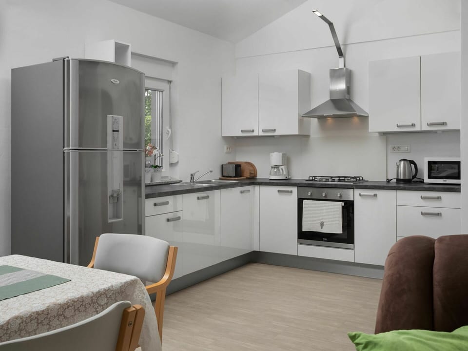 Room, White, Furniture, Kitchen, Property, Cabinetry, Countertop, Interior Design, Major Appliance, Refrigerator
