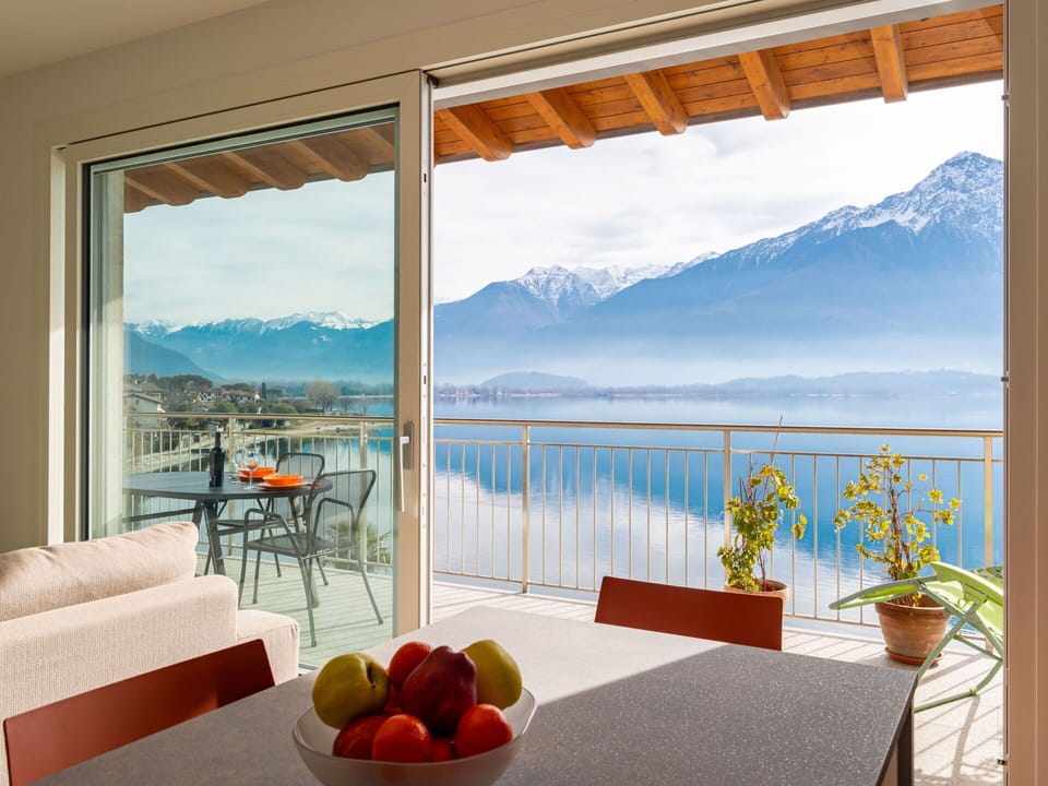 Sky, Table, Furniture, Property, Building, Window, Cloud, Flowerpot, Mountain, Azure
