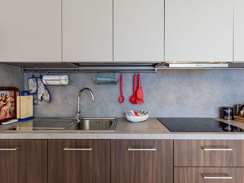 Tap, Cabinetry, Kitchen Sink, Countertop, Sink, Furniture, Plumbing Fixture, Kitchen, Wood, Interior Design