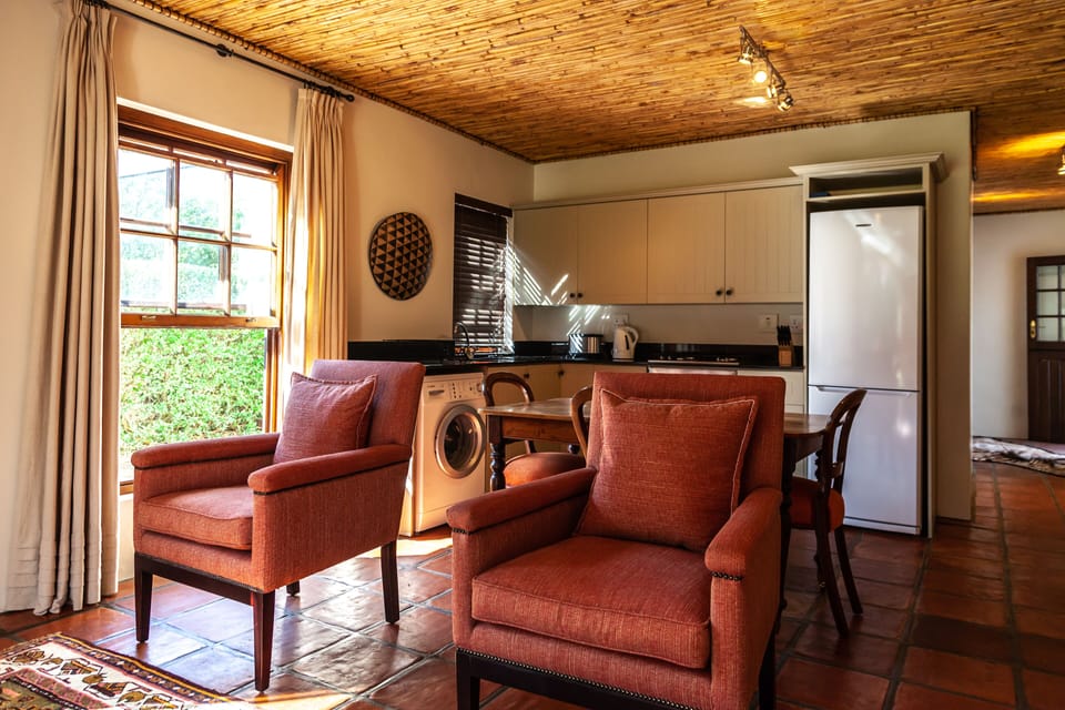 Luxury Cottage, 1 Bedroom | Living area | 32-inch flat-screen TV with satellite channels, TV
