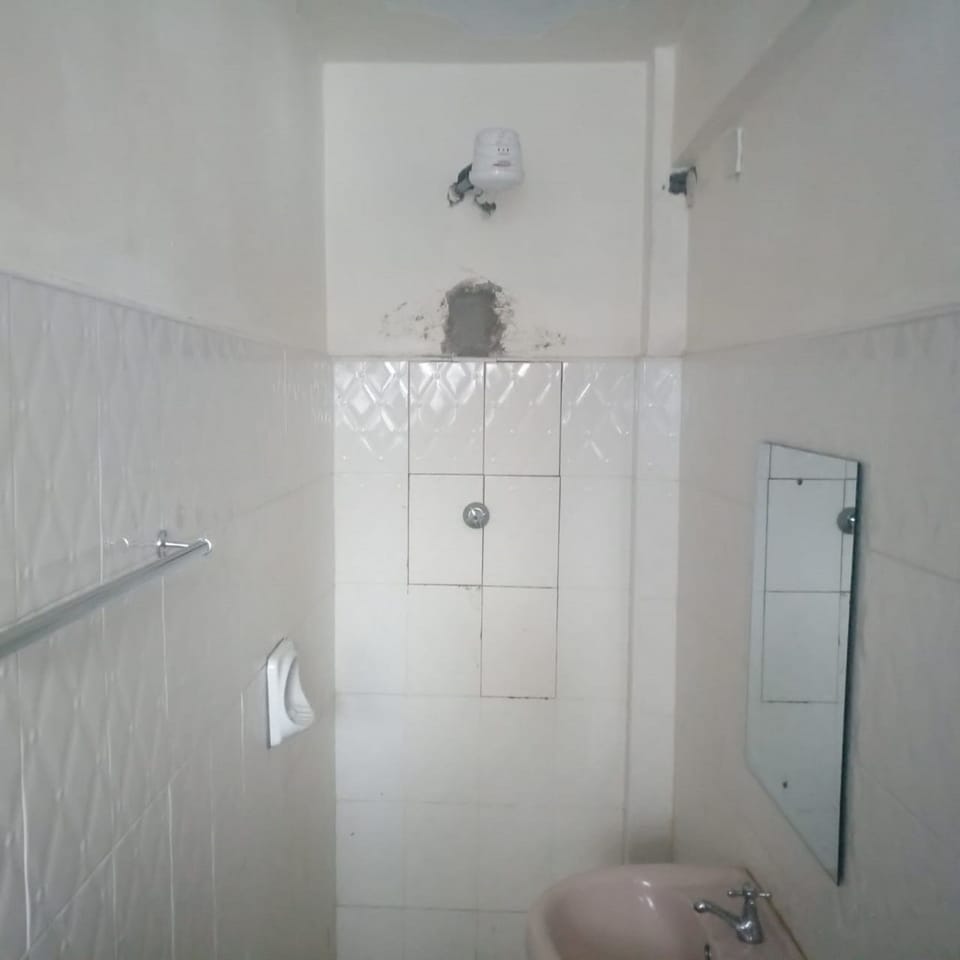 Shower, free toiletries, slippers, towels