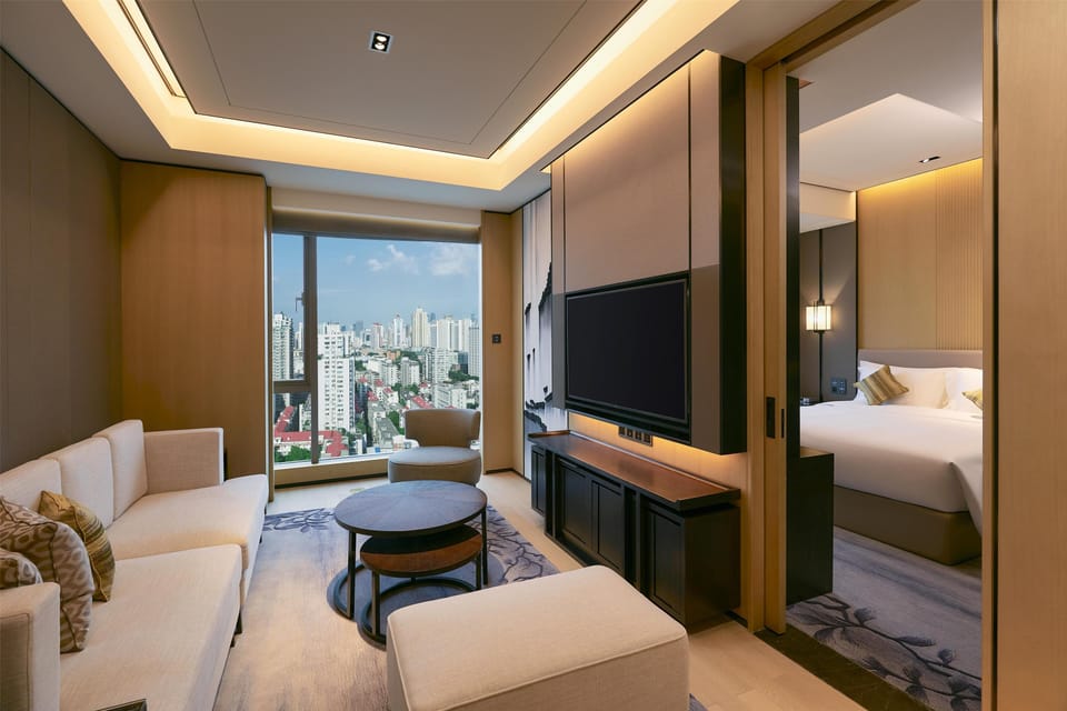 Suite (Deluxe 1 Bedroom) | Living area | 55-inch flat-screen TV with satellite channels, TV, pay movies