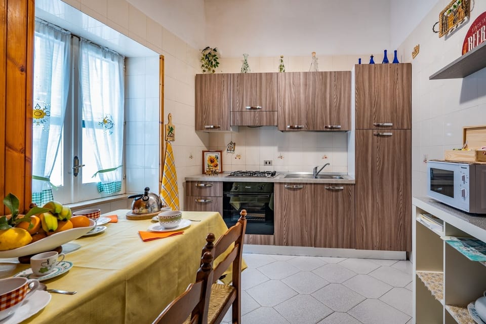 Apartment, 3 Bedrooms | Private kitchen | Full-size fridge, microwave, oven, stovetop