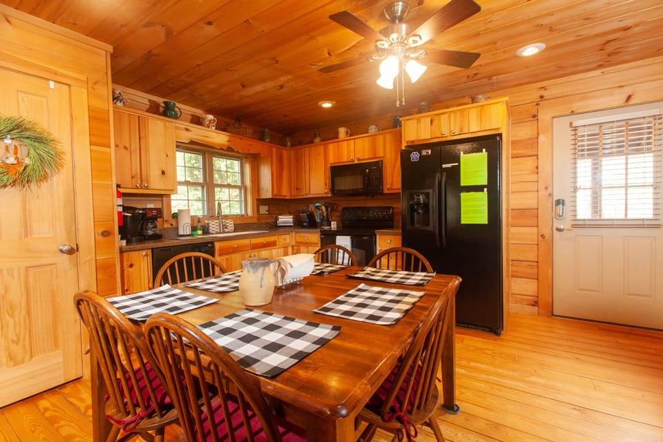 Eat in kitchen with a table that seats 8. Kitchen is fully supplied.