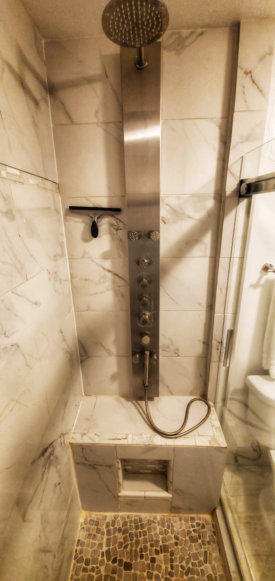 Primary Bathroom Shower Features an 8 Nozzle shower