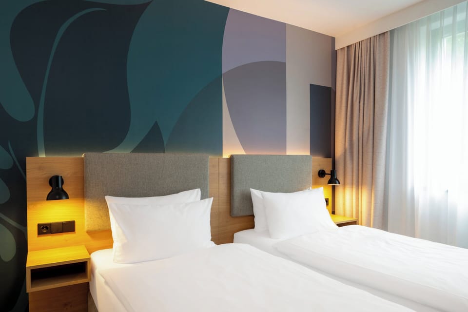 Hypo-allergenic bedding, in-room safe, desk, laptop workspace