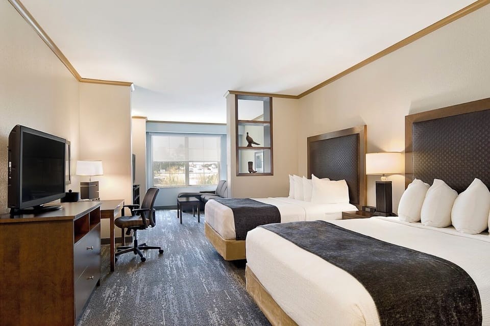 Junior Suite, 2 Queen Beds | Pillowtop beds, in-room safe, desk, iron/ironing board