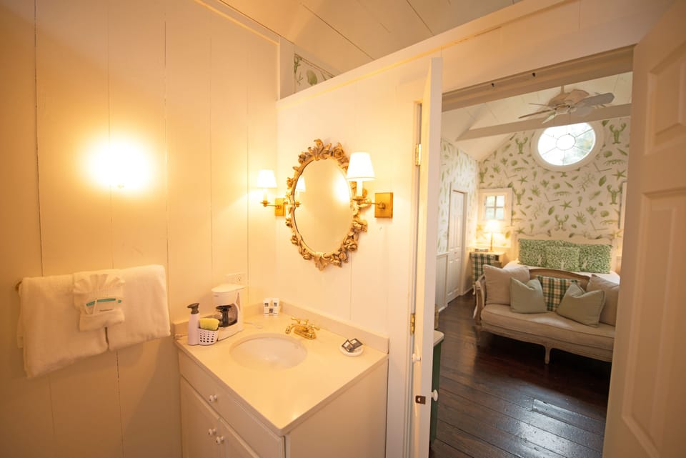 Anchorage Studio Queen Bed Cove View | Bathroom | Shower, free toiletries, hair dryer, towels