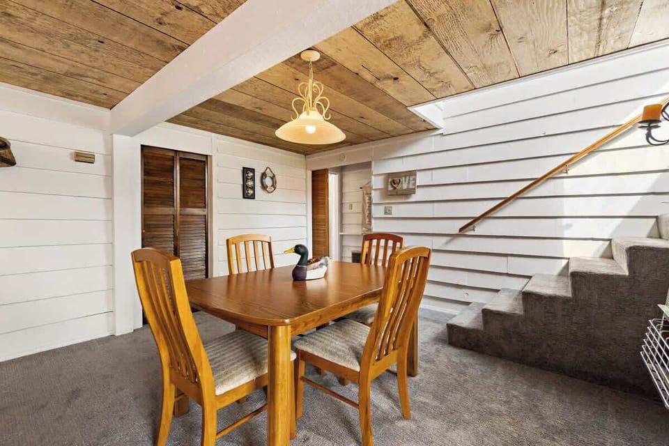 dining room table with view towards guest bedroom