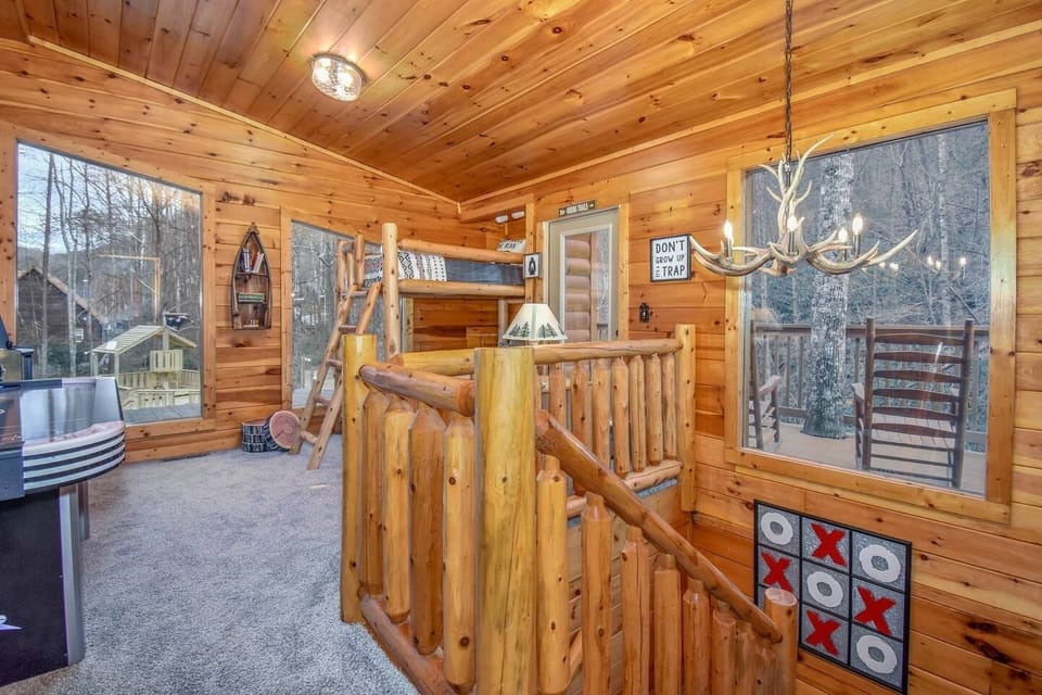 Game/reading table, checkers, Air Hockey, Multicade, Twin Bunks, Upstairs balcony access. (added a chain lock to the door to help keep the littles inside)