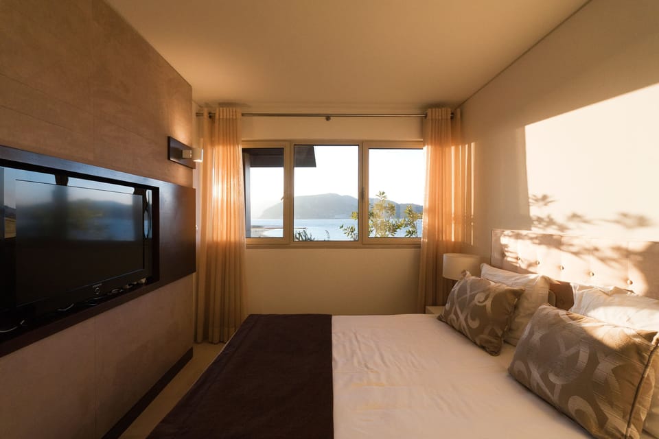 Apartment, 1 Bedroom, Sea View | Iron/ironing board, free cribs/infant beds, free WiFi, bed sheets