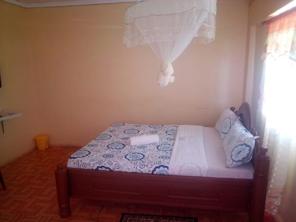 Double Room | Desk, blackout drapes, WiFi (free), bed sheets
