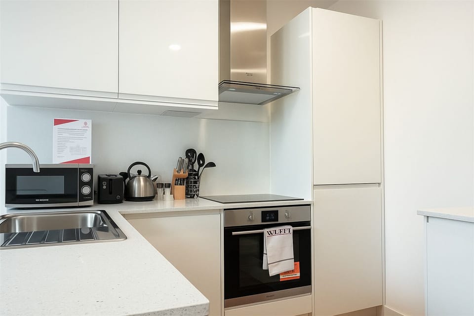 Apartment, 1 Bedroom | Private kitchen | Full-size fridge, microwave, oven, dishwasher