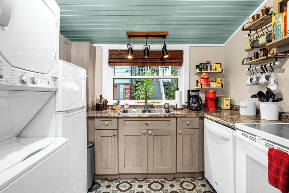 Fully stocked kitchen. Dishwasher, stove,  oven, washer/dryer, micro & Kuerig.