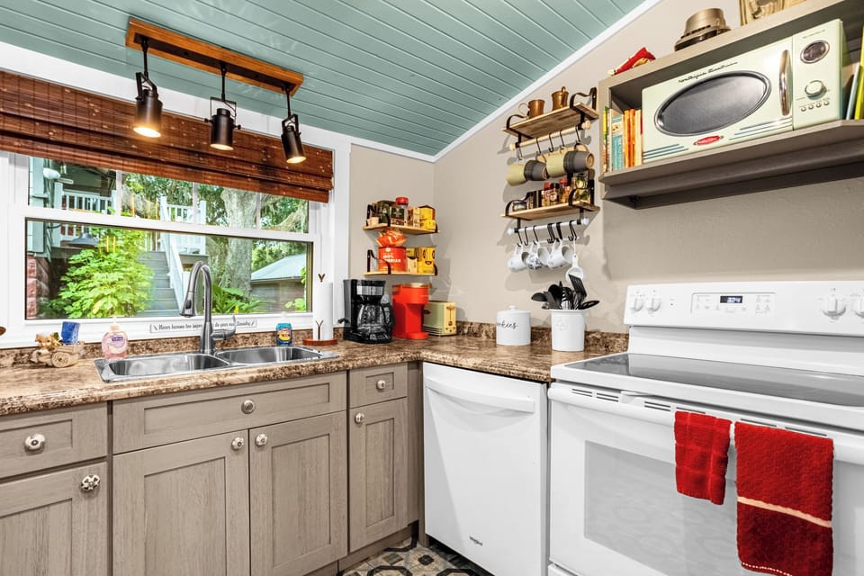 Fully stocked kitchen. Dishwasher, stove,  oven, washer/dryer, micro & Kuerig.