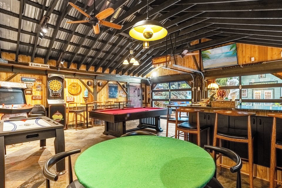 Bar with Pool/ping pong table, dart board, air hockey and more.  35 fee.