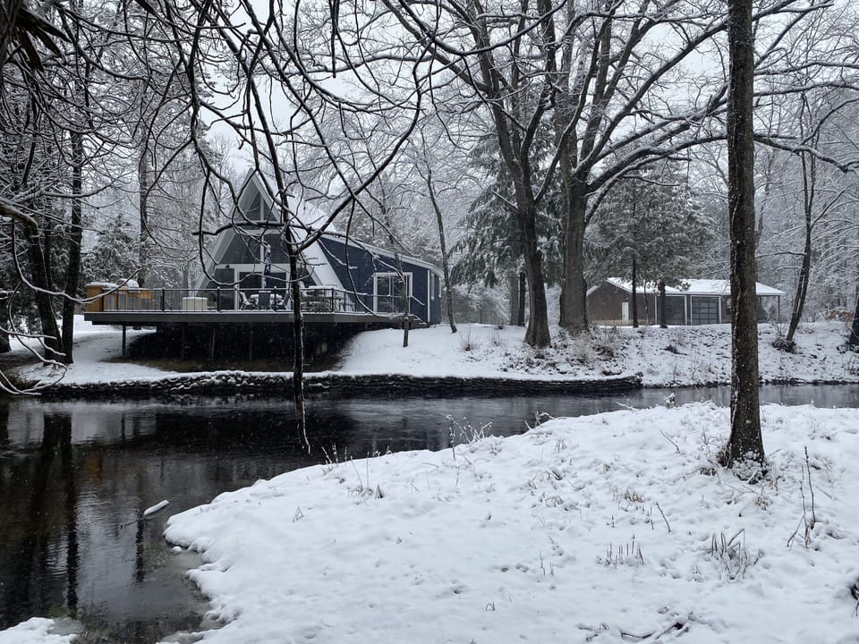 Looking at cabin from across the river