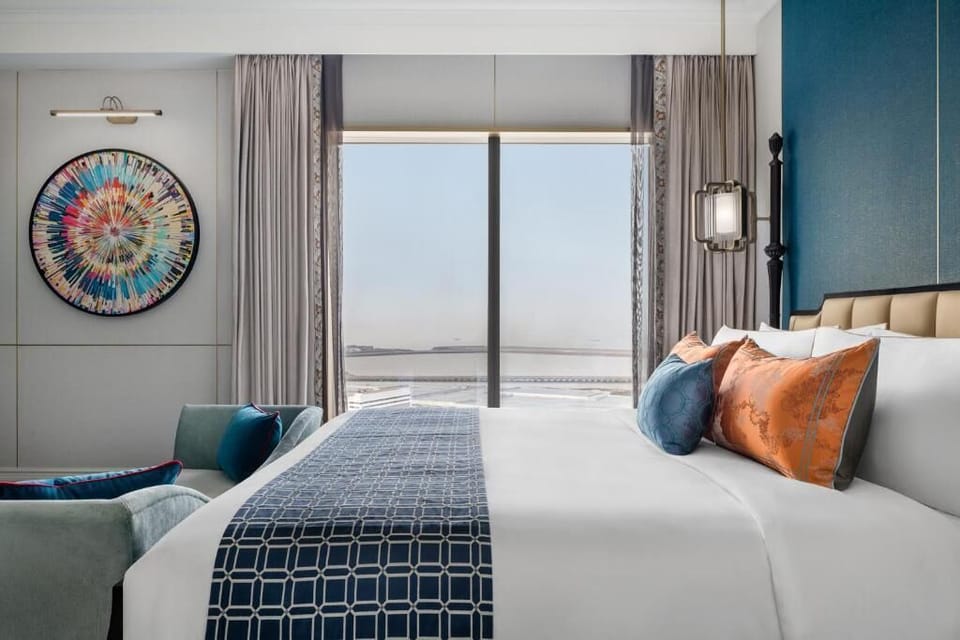 Corner Suite with Suite Privilege | Minibar, in-room safe, desk, laptop workspace