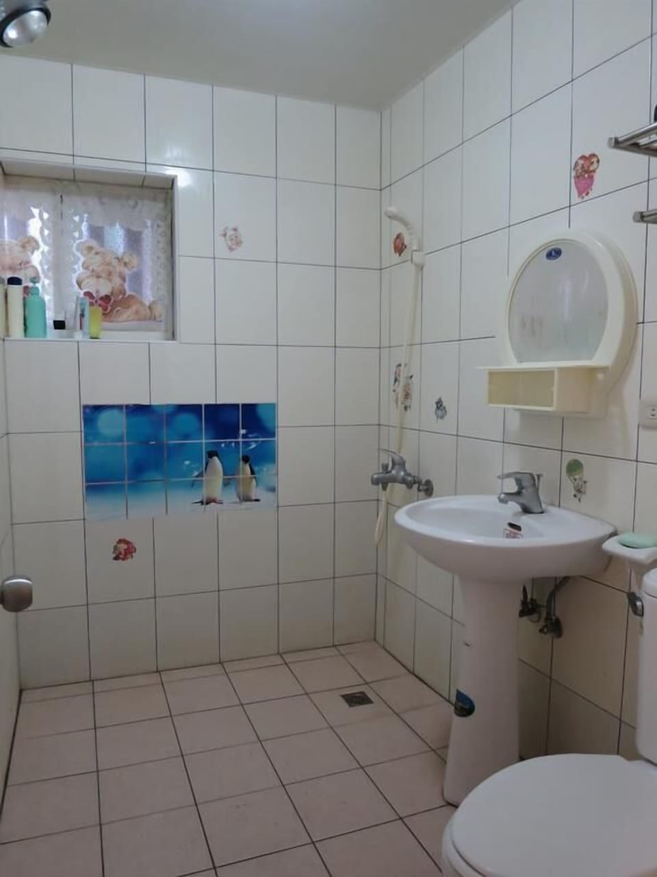 Standard Quadruple Room | Bathroom | Shower, hair dryer, slippers, towels