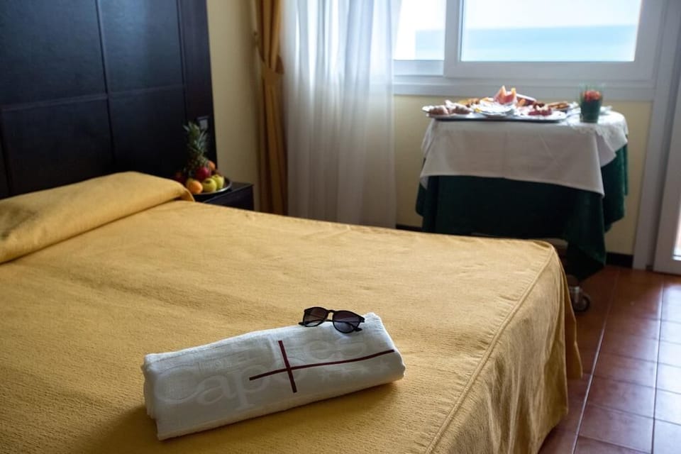 Superior Triple Room, Sea View | Minibar, in-room safe, desk, free cribs/infant beds