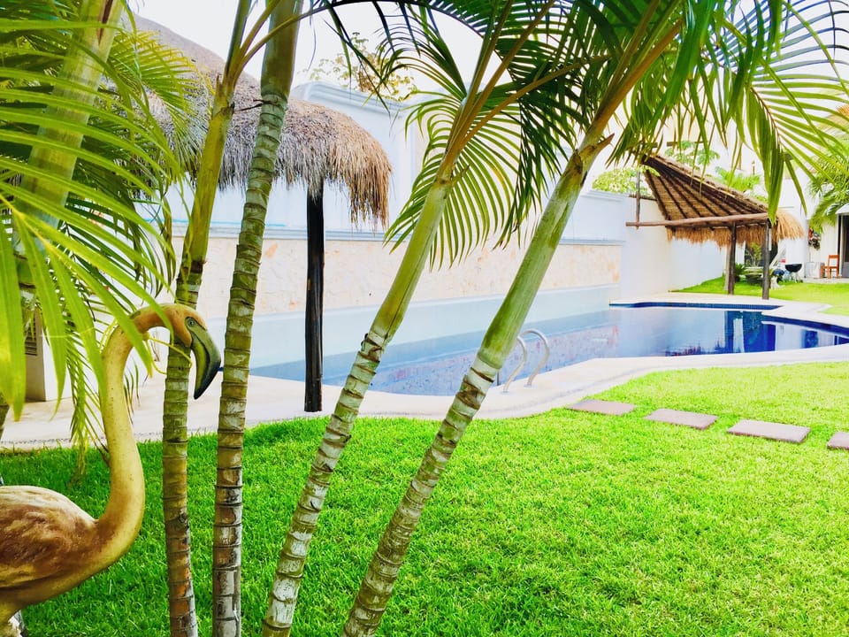 Room, 1 Bedroom, Patio, Garden View | Pool | Outdoor pool