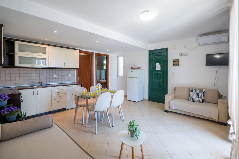 Apartment, 1 Bedroom, Garden View | Living room | TV