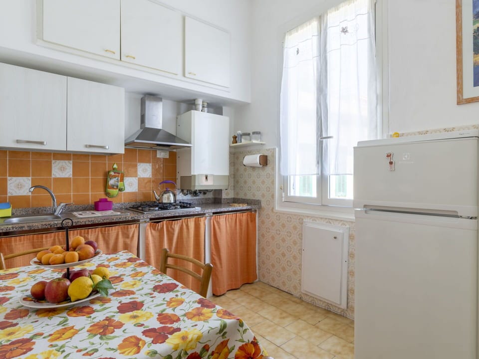 Cabinetry, Furniture, Countertop, Kitchen Appliance, Kitchen, Table, Refrigerator, Home Appliance, Wood, Building