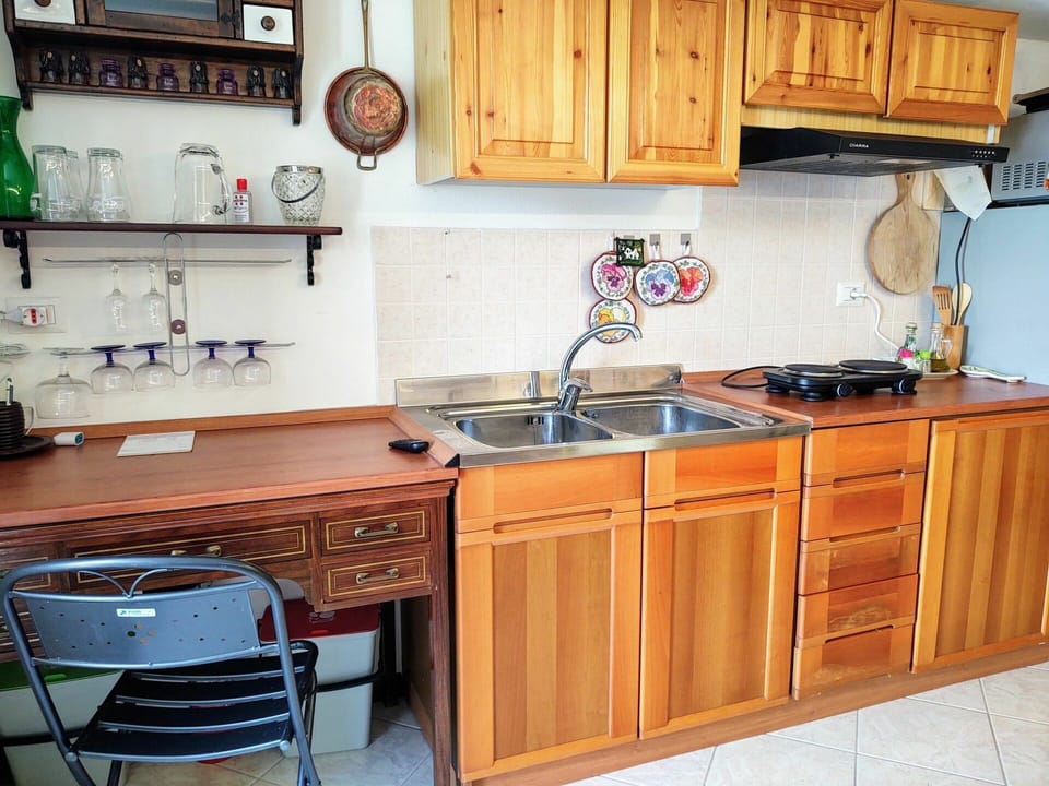 Cabinetry, Kitchen Sink, Countertop, Property, Tap, Furniture, Sink, Kitchen, Kitchen Appliance, Home Appliance