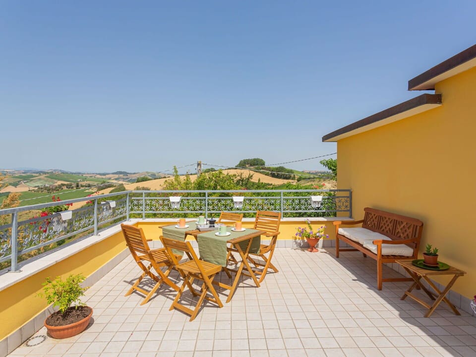 Sky, Plant, Furniture, Building, Flowerpot, Chair, Shade, Outdoor Furniture, Wood, House