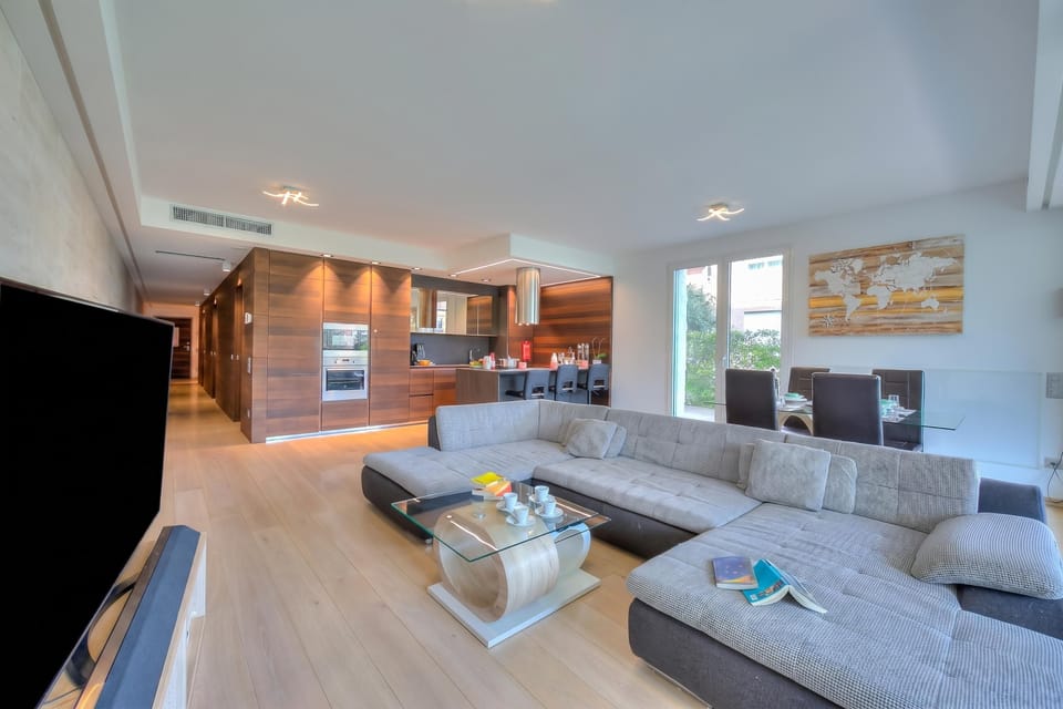 Family Apartment, Multiple Bedrooms, 2 Bathrooms (Rebecca Garden) | Living area | 22-inch flat-screen TV with digital channels, TV, DVD player