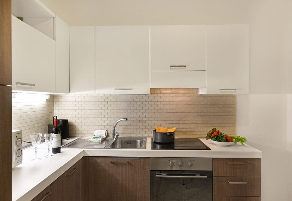Family Apartment, Multiple Bedrooms (Santiago Home) | Private kitchen | Full-size fridge, microwave, oven, stovetop